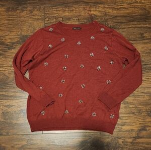 Red Sweater with Floral Embellishments